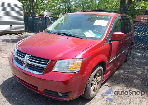 2010 Dodge Grand Caravan Sxt z USA, uszkodzony, nr VIN 2D4RN5DX5AR223609